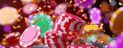 Stacks of colorful casino chips in red, green, purple, and yellow flying with confetti